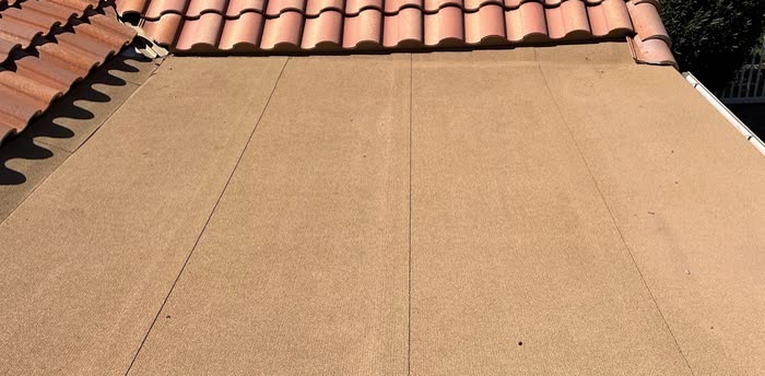 After: restored Colorado deck with rich stain