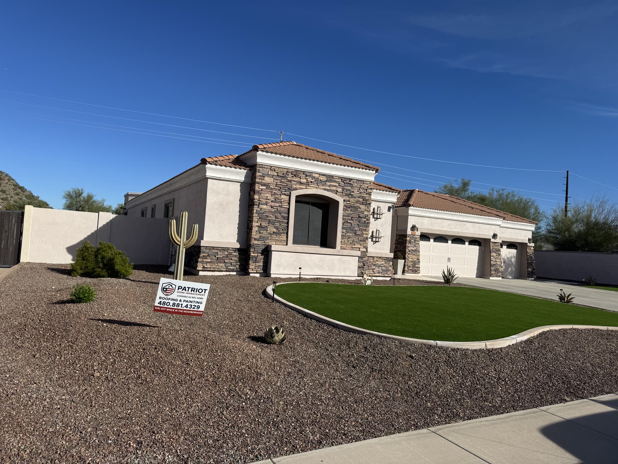 Sage-green stucco mountain home in Colorado