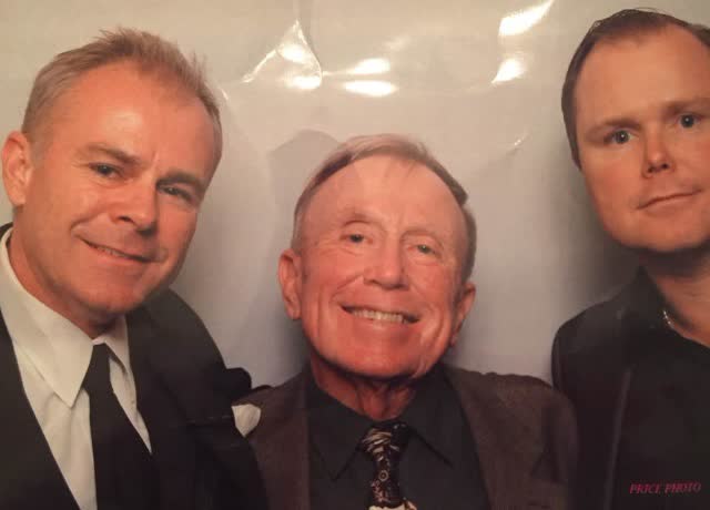 Three generations of the family. The founder (center) with his sons